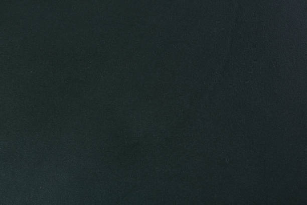 istock Texture of dark green leather on macro. 1206395500