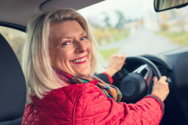 istock A woman out for a drive with her car 1206396249