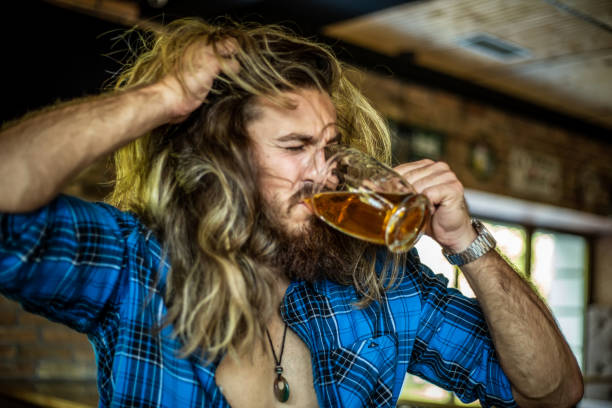 istock A man enjoying a beer at a bar 1206396468
