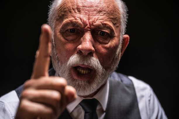 istock Angry senior man threatens 1206402548