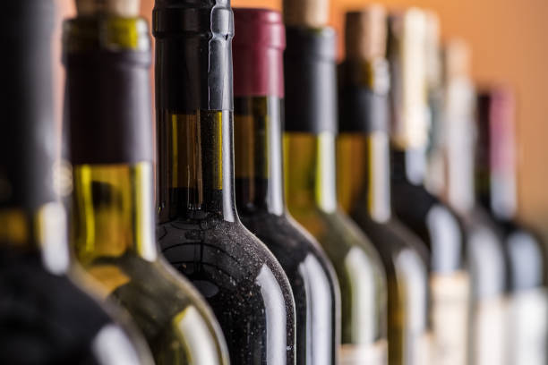 istock Line of wine bottles. Close-up. 1206402669