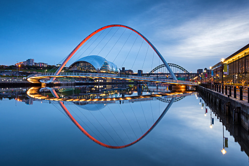 Millennium Bridge and Tyne Bridge at dusk on the River Tyne, Newcastle Upon Tyne, England, UK