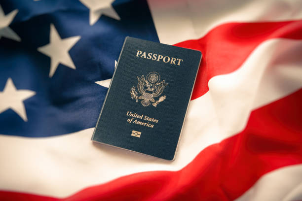 istock US passport on the american flag 1206404128