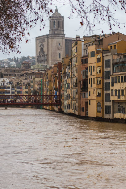 istock Brown growing river Onyar on hard rainstorms in Girona, Catalonia 1206405676