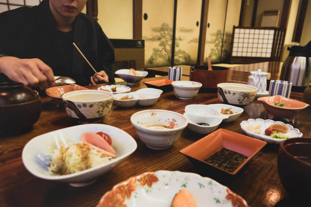istock Asian man having traditional japanese breakfest 1206406830