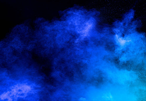 istock Blue color powder explosion on black background. 1206406857
