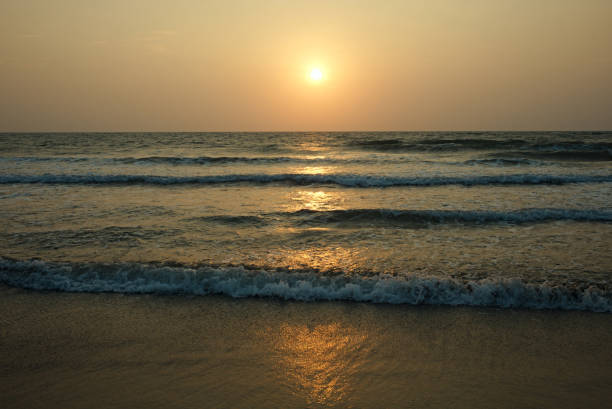istock Clear sky sunset on the sand beach 1206410038