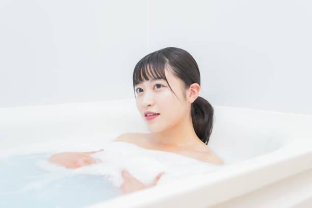 istock Young woman in the bath 1206423169