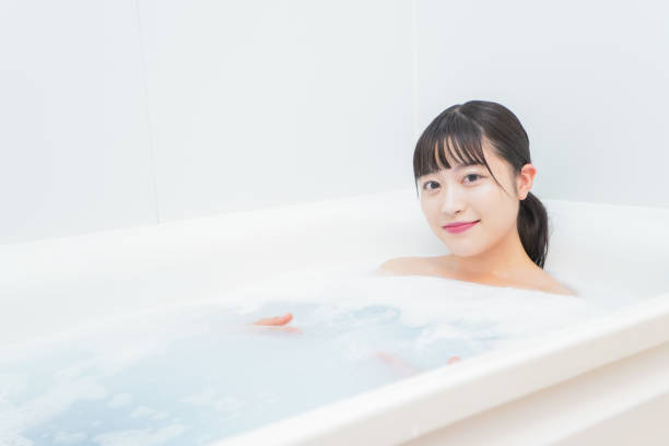 istock Young woman in the bath 1206423193