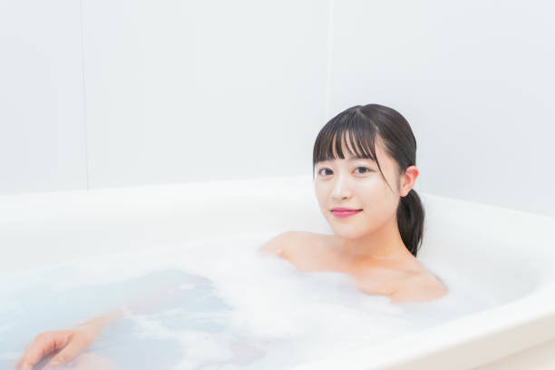 istock Young woman in the bath 1206423196