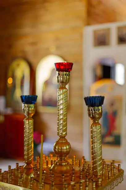 Photo of Golden candlestick in the church with lamps