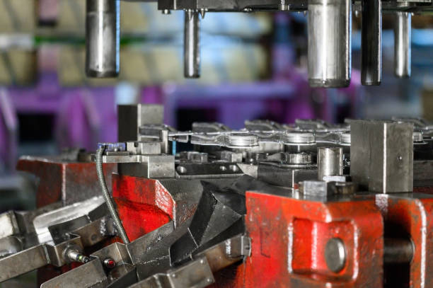 istock Sheet metal manufacturing process by hydraulic bending machine. 1206425465