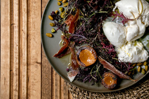 istock Salad with burrata cheese 1206425705