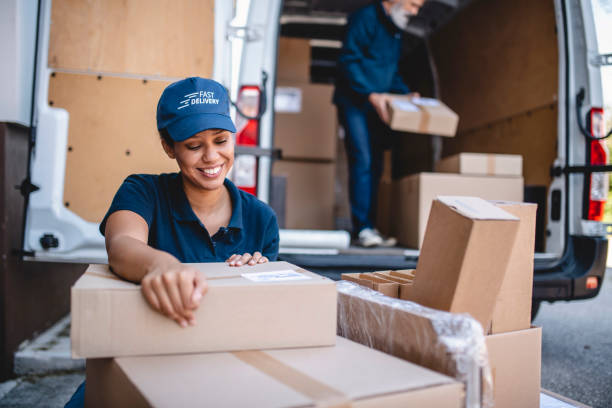 istock Millennial Generation Female Delivery Driver Checking Label 1206427246