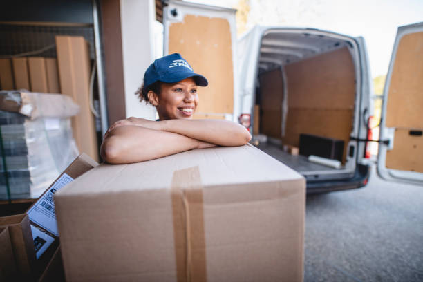 istock Smiling Millennial Woman Moonlighting as Gig Delivery Driver 1206427260