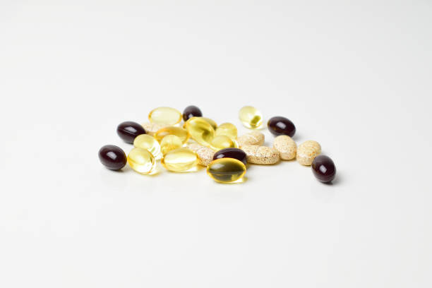 istock Astaxanthin, fish oil and vitamins. Side view. 1206429944