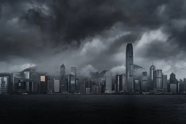 Photo of Thick cloud and fog shrouds buildings in Hong Kong