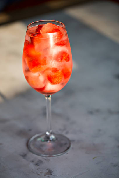 istock Flavored water with fresh strawberries in glass. 1206433864