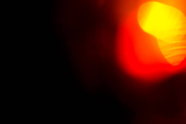 istock orange flare on a black background. beautiful light for design 1206435499