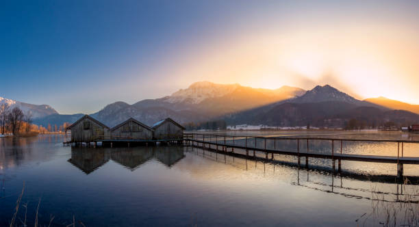 istock Boathouses on the Kochelsee, Bavaria, Germany 1206439800