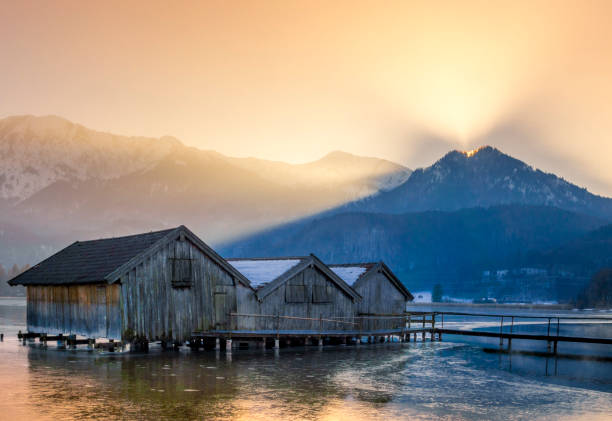 istock Boathouses on the Kochelsee, Bavaria, Germany 1206439841