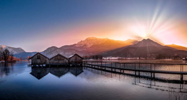 istock Boathouses on the Kochelsee, Bavaria, Germany 1206439931
