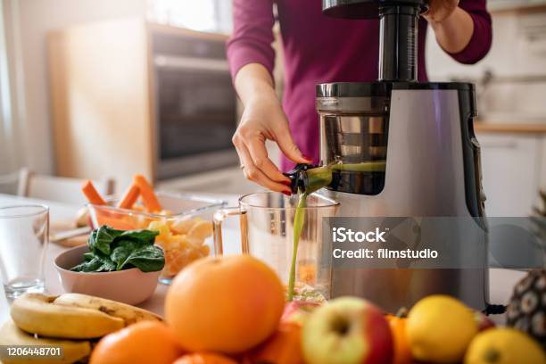 Preparing Cold Pressed Juice Stock Photo - Download Image Now - Electric Juicer, Juicer, Cold Pressed - Culinary Term