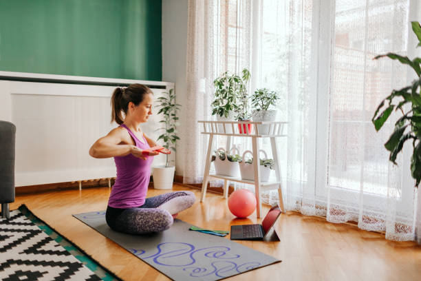 istock Sporty Woman Doing Pilates Exercise At Home 1206448769