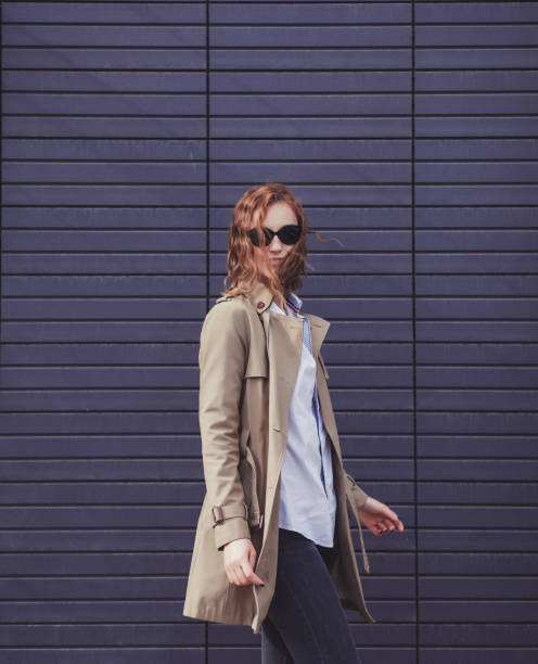 istock woman model in trendy coat 1206448823