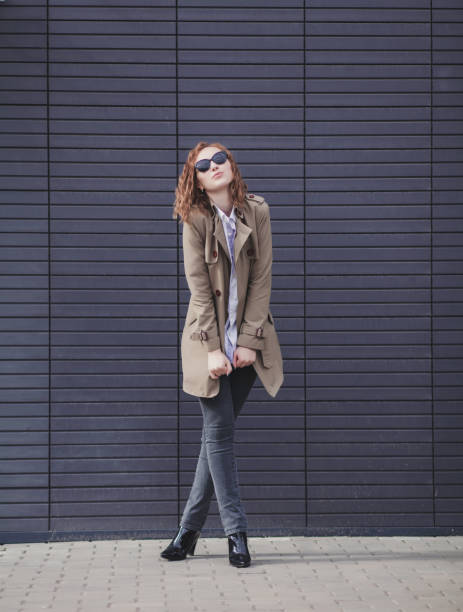 istock young smiling woman in spring jacket 1206448835