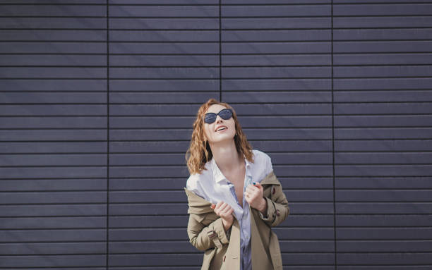istock woman wearing trendy coat 1206448844