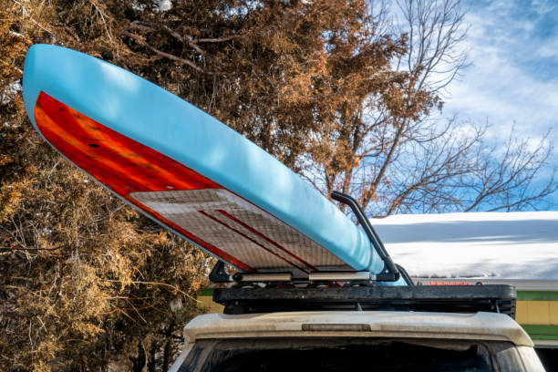 istock Unlimited racing stand up paddleboard on roof racks 1206448981
