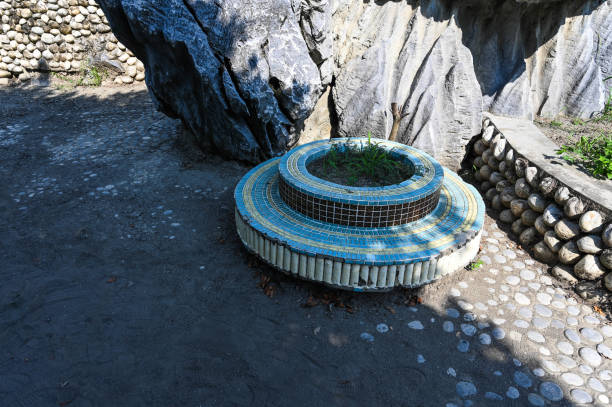 Round tile seat in the park.