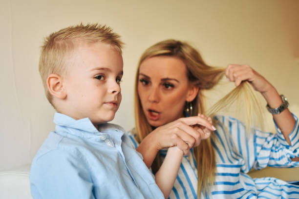 istock Happy mom plays with her son at home 1206450200