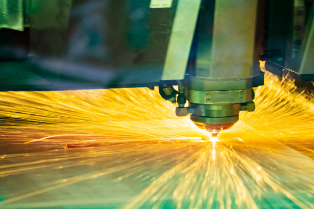 istock Laser metal cutting CNC machine in operation. 1206451585