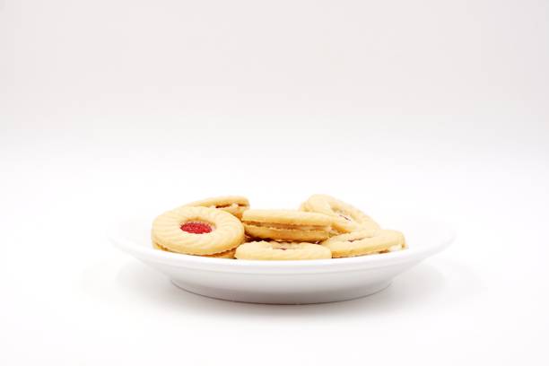 istock Sandwich cookies with cream and strawberry jam 1206452056