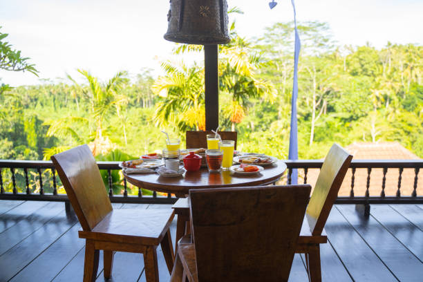 istock Chairs and table with breakfast in outdoor cafe 1206454741