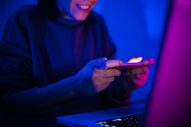 Woman play mobile game