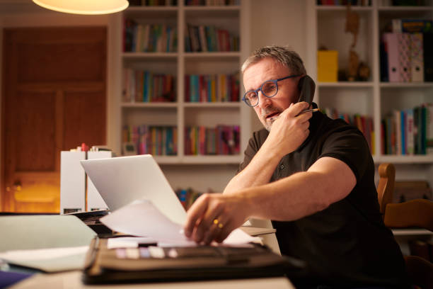 istock small businessman on the phone 1206456968