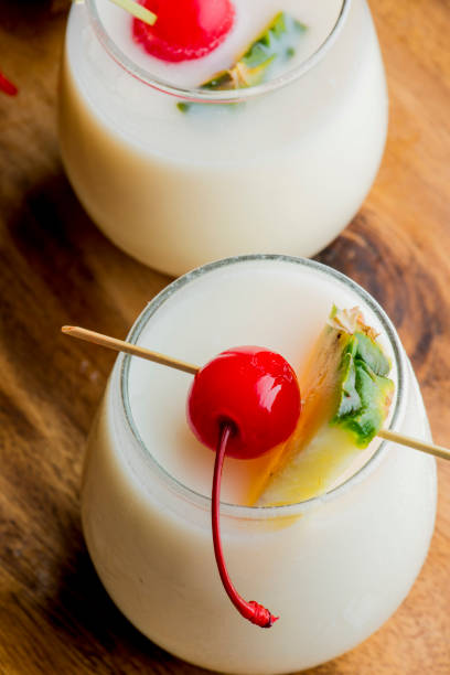 Frozen cocktails. ﻿﻿Cocktails, traditional drinks made by artisanal bartenders or mixologists in speakeasy & upscale bars or dive bar taverns.Cocktails served in chilled cocktail glasses and garnished with fruit.