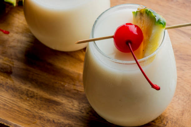 Frozen cocktails. ﻿﻿Cocktails, traditional drinks made by artisanal bartenders or mixologists in speakeasy & upscale bars or dive bar taverns.Cocktails served in chilled cocktail glasses and garnished with fruit.