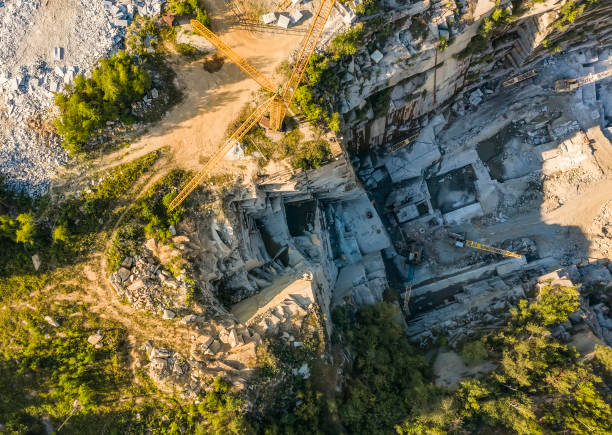 istock Stone sorting conveyor belt in large Quarry - Top down aerial view 1206460038