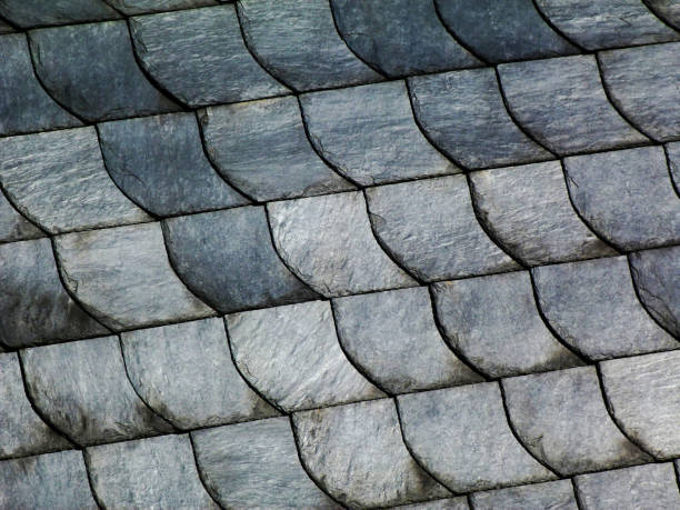 istock natural slate mineral tile roof detail in fish scale pattern 1206462947
