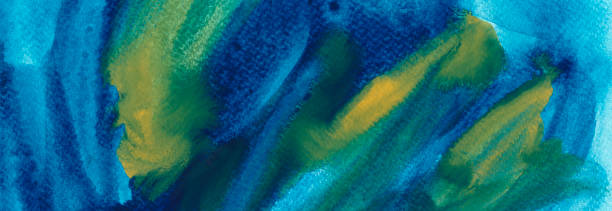 istock Bright blue, yellow and green watercolor abstract background. Hand drawn deep navy blue shades 1206463922