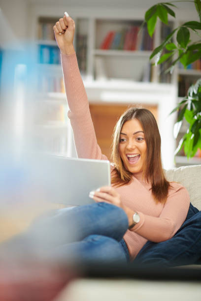 istock excited online gamer 1206466887