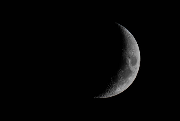 cresent moon a close up of the crescent moon showing detailed texture on surface crescent photos stock pictures, royalty-free photos & images
