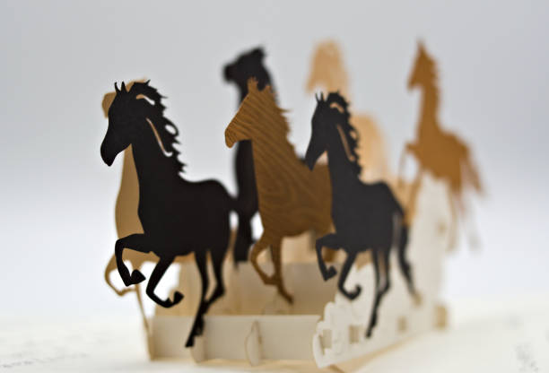 istock origami of running horses. 1206467767