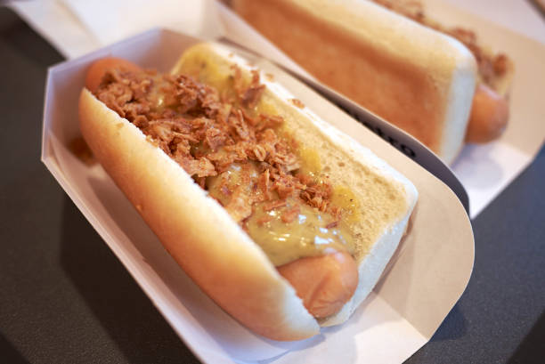istock Hot Dog with mustard and onion crumble 1206468827
