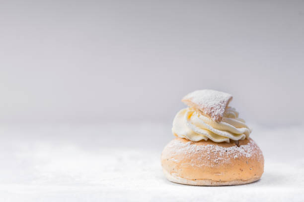 istock Semlor, traditional scandinavian cream filled cardamom bun with almond paste 1206469232