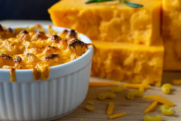 Photo of Macaroni and cheese in white baking dish.